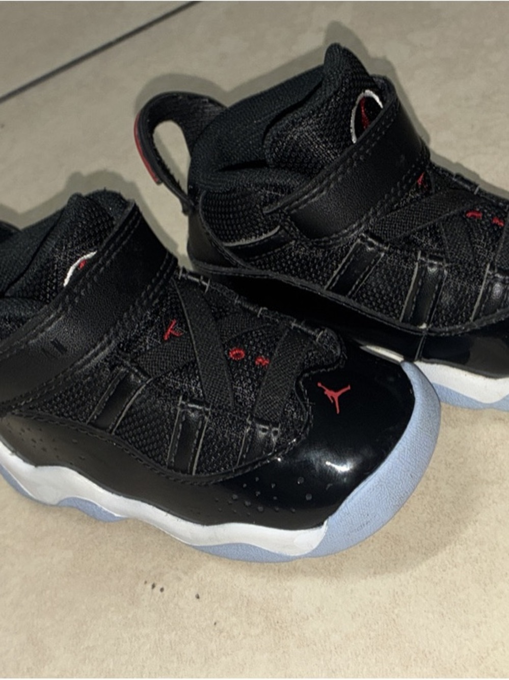 Jordan Kids Black and Red High-Top Sneakers